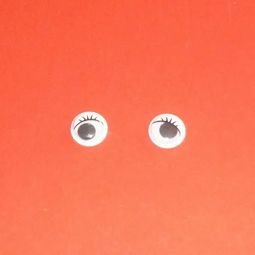 4 cabochons à yeux noirs et blancs 10mm